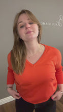 Load and play video in Gallery viewer, Saint Tropez - V Neck Orange Jumper- Mila
